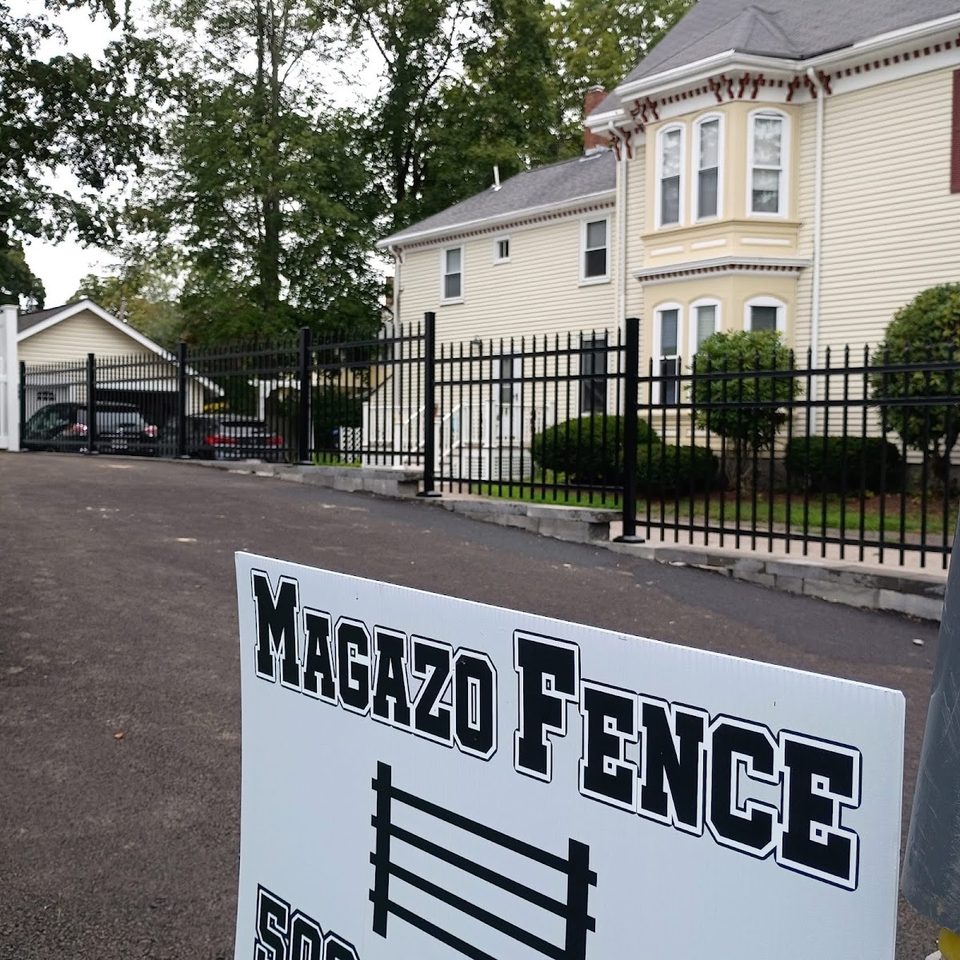 Ornamental aluminum fence installed across a front yard
