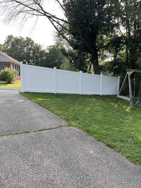Vinyl privacy fence with an integrated walk gate